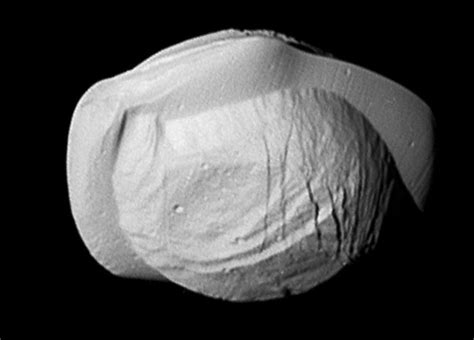 Fried Egg Flying Saucer Nope Just Cool New Closeups Of Saturns Moon