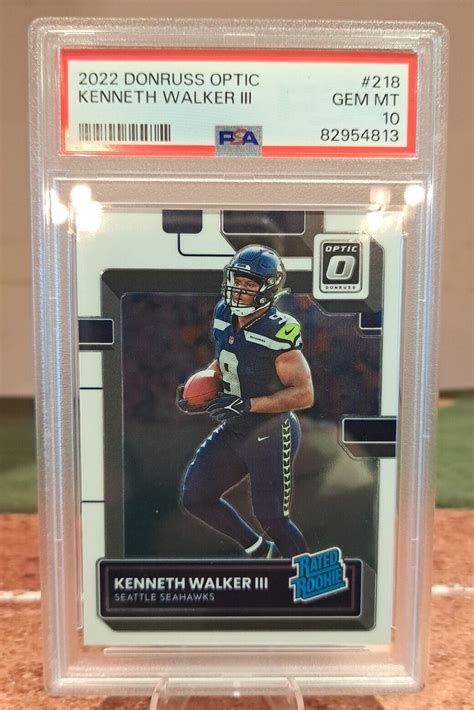 Kenneth Walker Iii Optic Base Price Guide Sports Card Investor