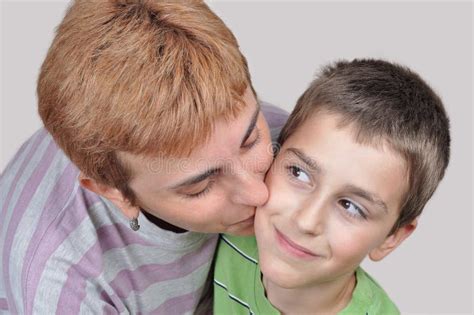 Mother Kissing Her Son Stock Image Image Of Joyful Hair 74011679