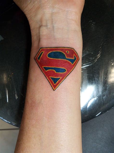 Supergirl Tattoo Ideas Find this pin and more on tattoos by ms