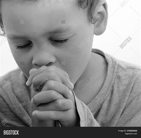 Boy Praying God Hands Image And Photo Free Trial Bigstock