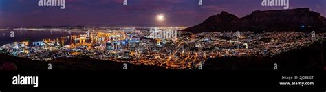 A panoramic view of Cape Town Skyline at night Stock Photo - Alamy