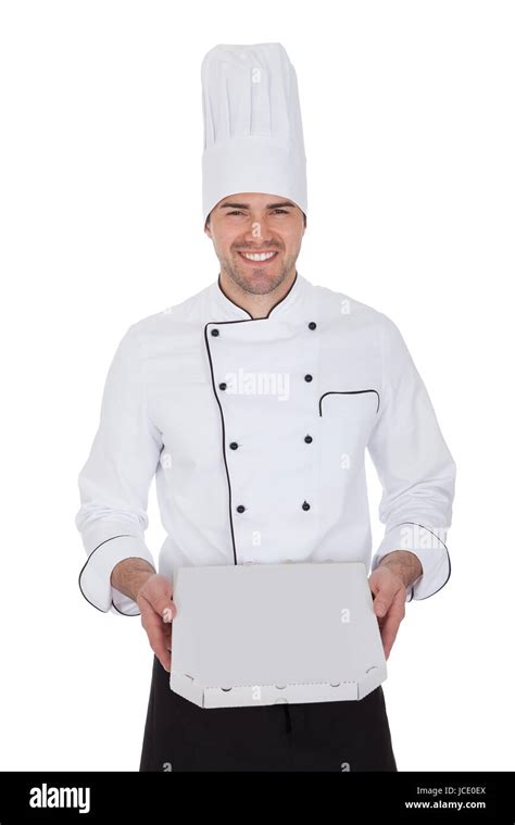 Portrait Of Happy Chef Holding Pizza Box Isolated On White Stock Photo