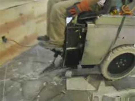 Tearout & Removal of Ceramic Tile with ride on machine. - YouTube