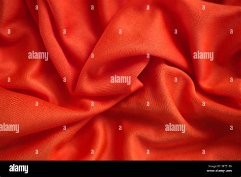 Red Crumpled Fabric Texture Background Close Up Stock Photo Alamy