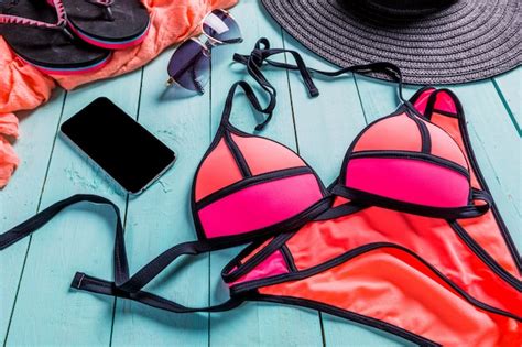 Set Of Beach Clothes Pink Bikini Premium Photo