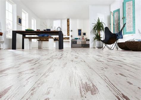 Кварцвинил или ламинат: что лучше, чем отличаются