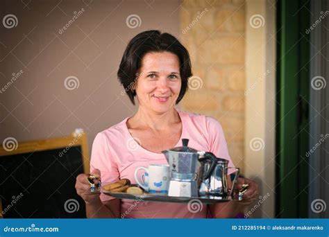 Beautiful Tanned Brunette Woman Carries A Tray Of Tea Stock Photo Image Of Room Autumn