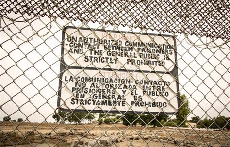 Sign at a Prison Fence with Barbed Wire Limiting Contact with Inmates ...