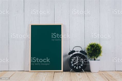 Blank Green Chalkborad With Wood Frame And Little Decorative Tree In White Vase And Vintage