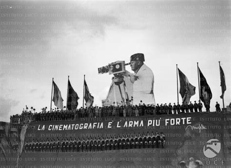 Apparato Scenografico Con Gigantografia Di Mussolini E Scritta