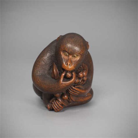 SOLD Wood Netsuke Of A Monkey With Biwa Fruit By Kano Tomokazu