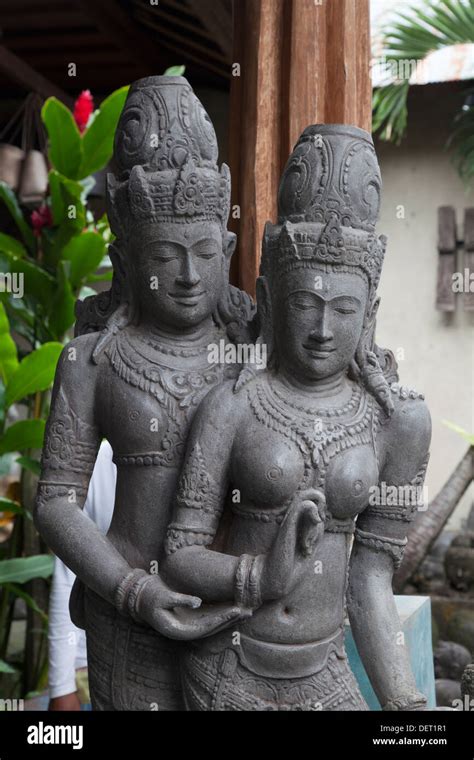 Indonesian stone statue couple man wife God gods deities religious religion holy tradition ...