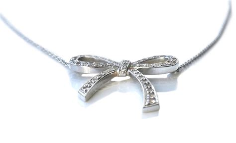 Tiffany And Co 027ct Diamond And Platinum Bow Pendant Necklace Rrp £3