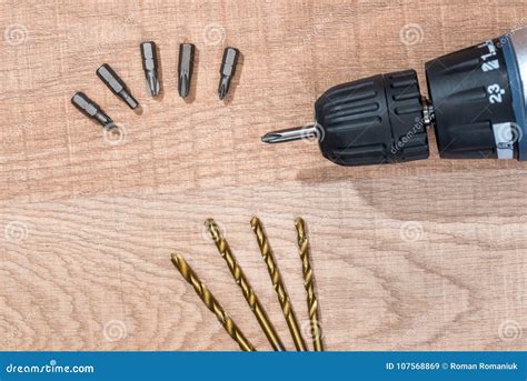 Drill And Set Of Golden Drill Bits Stock Image Image Of Power Golden