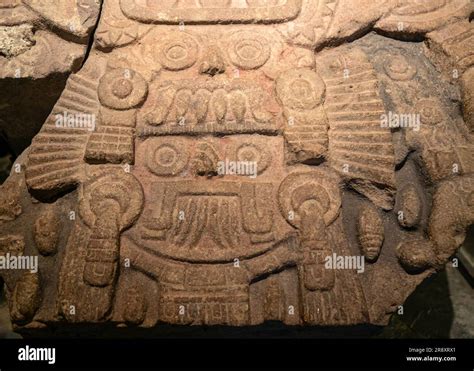 Carved Stone Monument Depicting Tlaloc And Tlaltecuhtli Gods Of Water