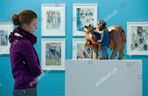 Woman Looks Sculpture Farmer Cow By Editorial Stock Photo - Stock Image ...