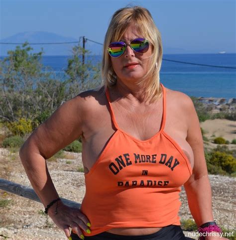 Milf Chrissy Takes A Naturist Vacation To Greece And Shows Off Her Big Tits Photos
