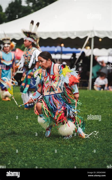 Young Native American Boy Dressed In Colorful Dancing Outfit At Pow Wow