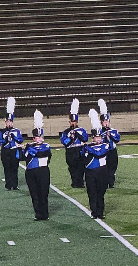 the marching team is performing on the field