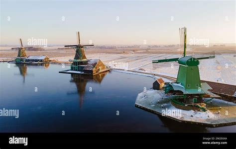 Zaanse Schans Windmill Village During Winter With Snow Landscape In The