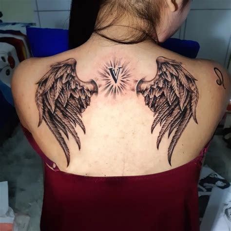 Angel Wings Tattoos On Neck