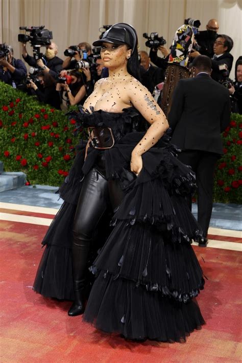 Nicki Minaj walks Met Gala 2022 red carpet with boobs popping out