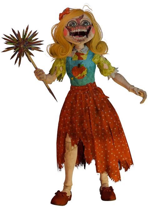 A Creepy Doll Holding A Fake Star In Her Right Hand And Wearing A Dress