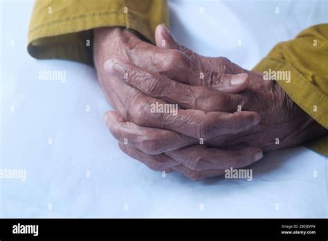 folded hands dying person  res stock photography  images alamy