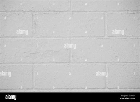 Brick wall painted with a white paint, closeup background Stock Photo ...