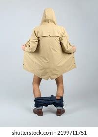 Exhibitionist Exposing Naked Body Under Coat Stock Photo