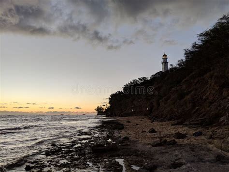 Diamond Head Lighthouse A Stunning Sunset On Oahu S Rocky Shore Stock