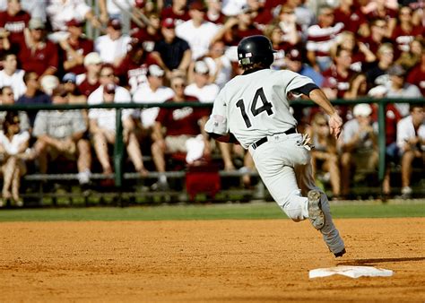 Baseball Player Number 14 Chasing Goal on Baseball Field · Free Stock Photo