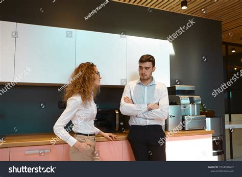 Candid Shot Two Coworkers Talking Brunette Stock Photo Shutterstock