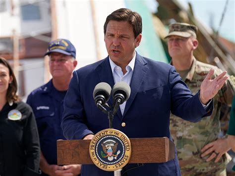 Photo Of Gov Ron Desantis Behind Presidential Seal In Florida Goes