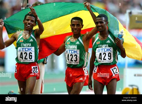 Ethiopia S Gold Medalist Kenenisa Bekele Celebrates With Silver Medalist Haile Gebrselassie L