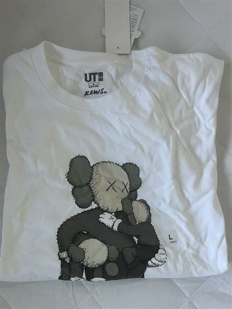 Uniqlo Uniqlo x KAWS | Grailed