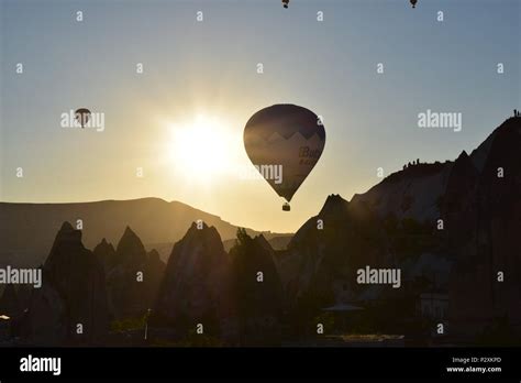 Hot air balloons at sunrise Stock Photo - Alamy