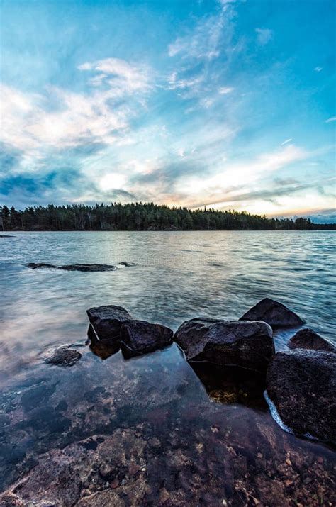 Rocks In Lake Stock Photo Image Of Background Sweden 62350930