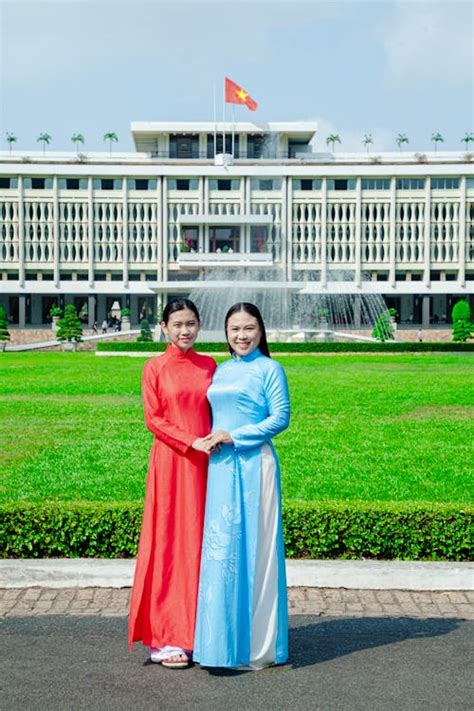 Women In Red And Blue Traditional Dress · Free Stock Photo