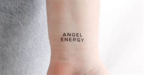 Angel Energy Temporary Lettering Tattoo Placed On The