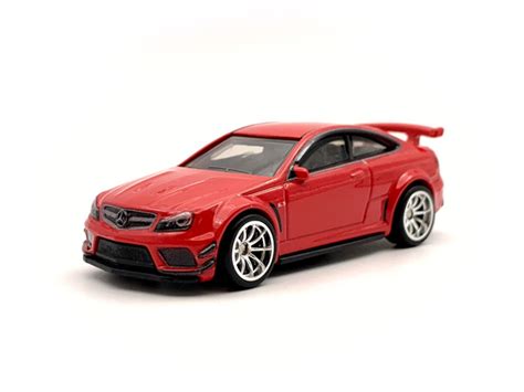 Машинка Hot Wheels Premium 12 Mercedes Benz C63 AMG Coupe Black Series купить с доставкой по