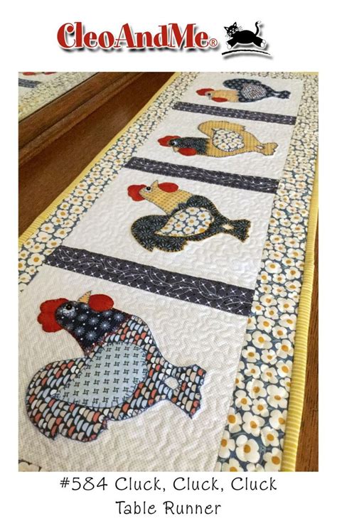 A Table Runner With An Image Of Chickens On It