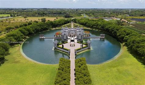 Outrageous Castle Is Its Own Artificial Island With Moat, a Boathouse ...