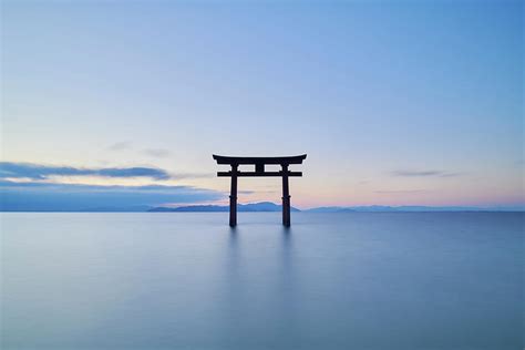 Long Exposure Shot Of Shirahige Shrine Torii Gate At Sunrise Lake Biwa