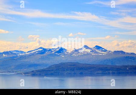 View of 'Molde panorama' taken from Varden viewpoint - showing the fjord and the snow clad peaks ...