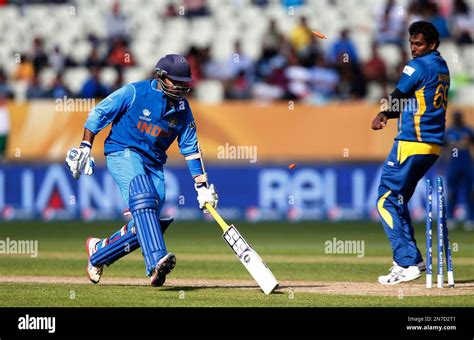 Indias Dinesh Karthik Left Gets To The Crease Avoiding A Run Out