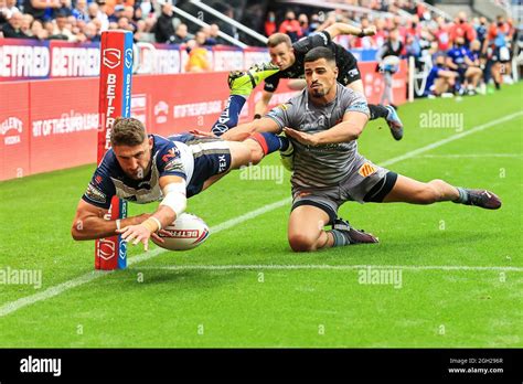 Tommy Makinson Of St Helens Goes Over For A Try Stock Photo Alamy