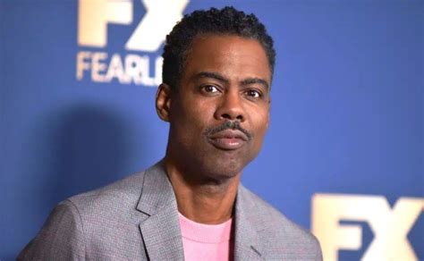 Después de un año de la bofetada de Will Smith Chris Rock le responde