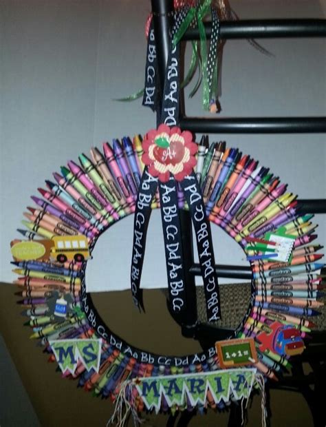 A Wreath Made Out Of Crayons And Paper